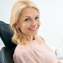 Woman smiling in the dental chair